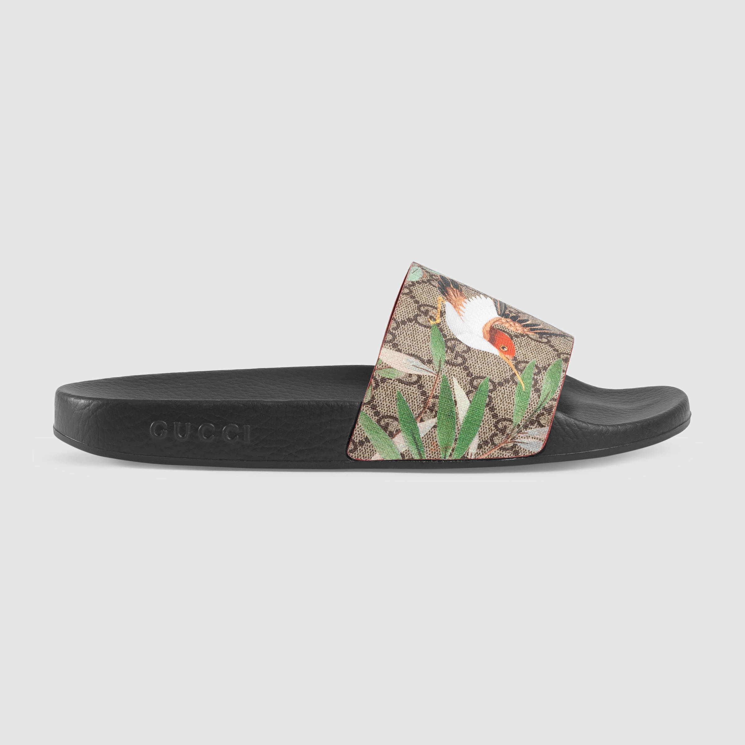 Gucci slides store with bird